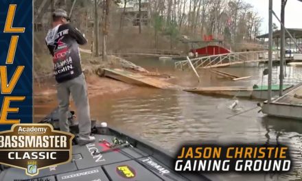 Bassmaster – CLASSIC: Jason Christie catches a good fish wrapped up in a dock
