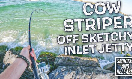COW STRIPED BASS on Inlet Jetty – Long Island Surf Fishing Bucktails in DANGEROUS WAVES JETTY ROCKS!